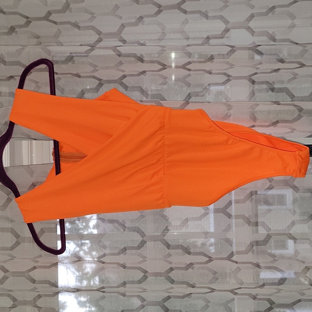 Neon orange body suit